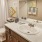 a bathroom with a marble countertop